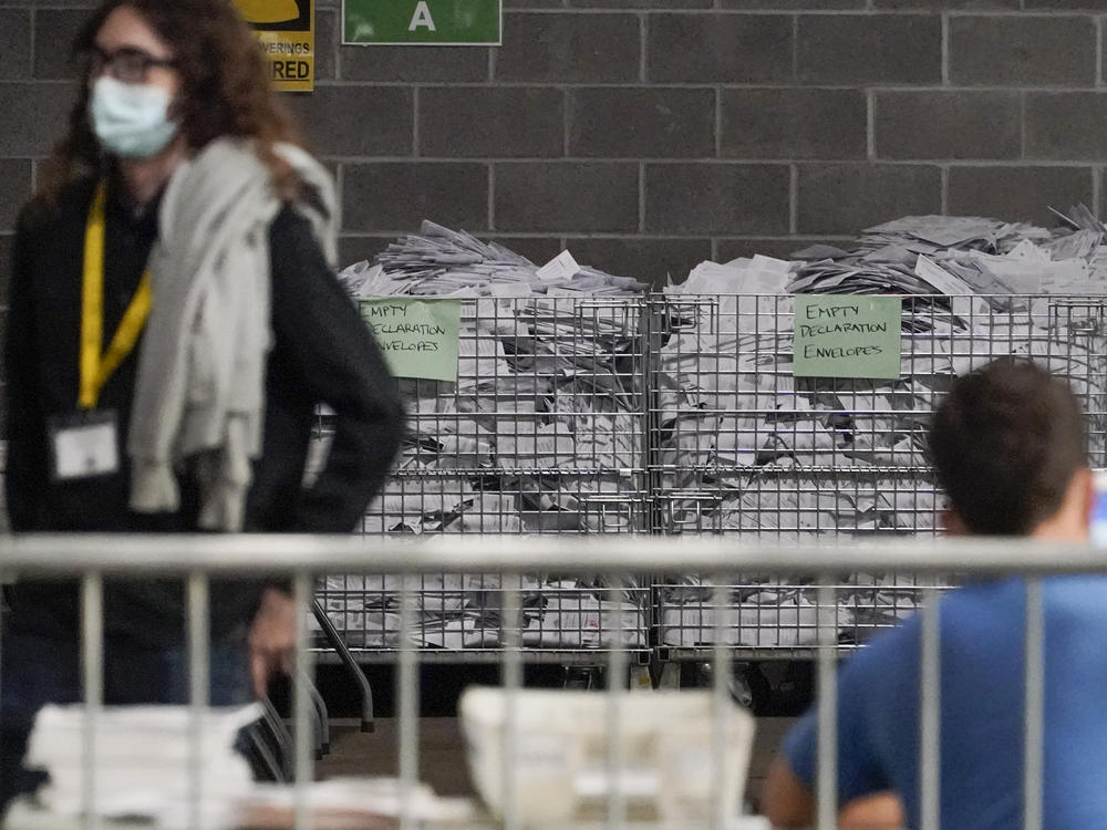 Election office workers process ballots at the Allegheny County elections returns warehouse in Pittsburgh, earlier this month.