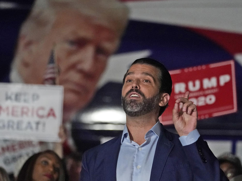 In this Nov. 5 photo, Donald Trump Jr. gestures during a news conference at Georgia Republican Party headquarters in Atlanta. Trump Jr. has been infected with the coronavirus but says he is currently asymptomatic.