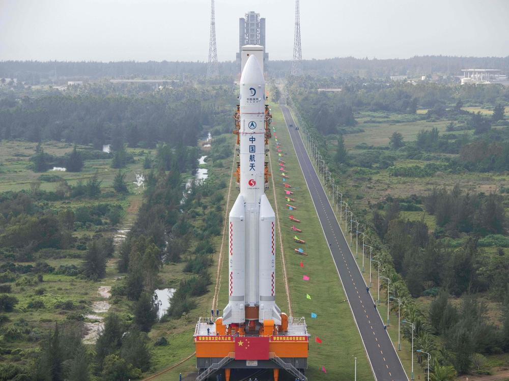 The rocket, pictured on Nov. 17, will launch China's Chang'e-5 lunar probe on Tuesday. Here it is being transported to the launching area at the Wenchang Spacecraft Launch Site in southern China's Hainan province.