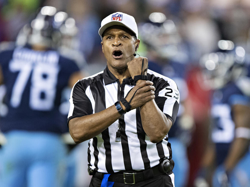 Referee Jerome Boger makes a holding call penalty during a game between the Tennessee Titans and the New York Jets in Nashville, Tenn., on Dec. 2018. Boger lead an all-Black officiating crew during Monday Night Football on Nov. 23.