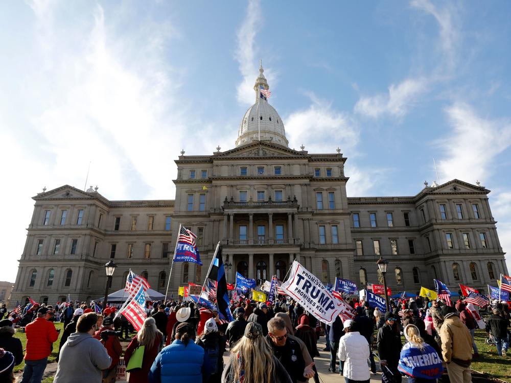 Protesters gather in support of President Trump on Nov. 14 at the Michigan Capitol in Lansing. Trump and his allies have baselessly alleged widespread voter fraud was to blame for the president's election loss.