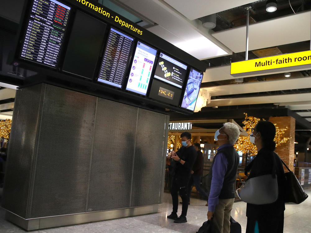 The British government will slash the quarantine time for some overseas travelers if they produce a negative coronavirus test after five days of quarantine.
