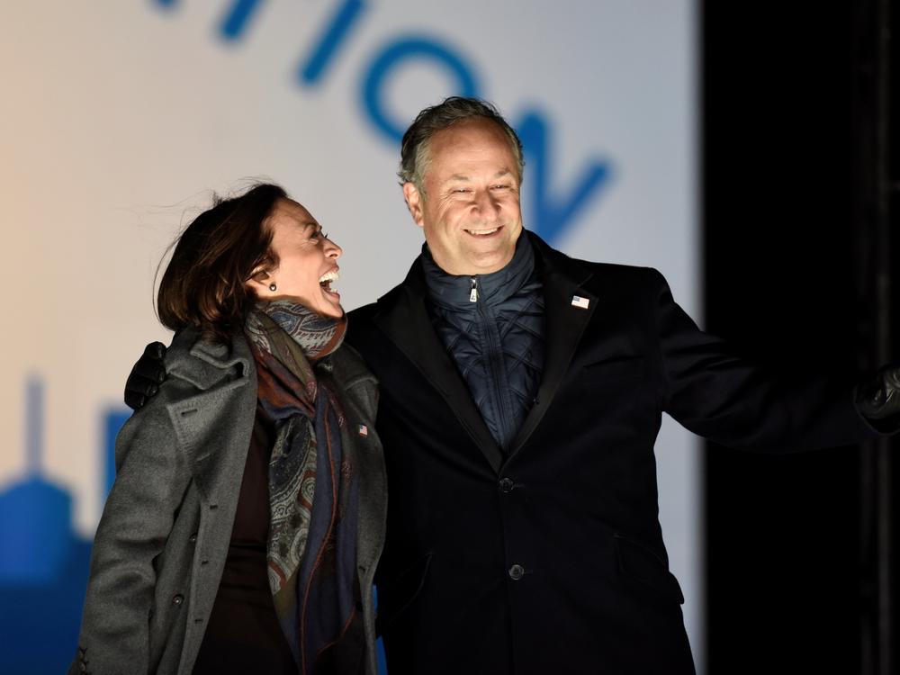 Doug Emhoff joins his wife, Kamala Harris, for a get-out-the-vote rally Nov. 2 in Philadelphia. With Harris set to become vice president, Emhoff has said he will give up his career, for now, to serve as second gentleman.