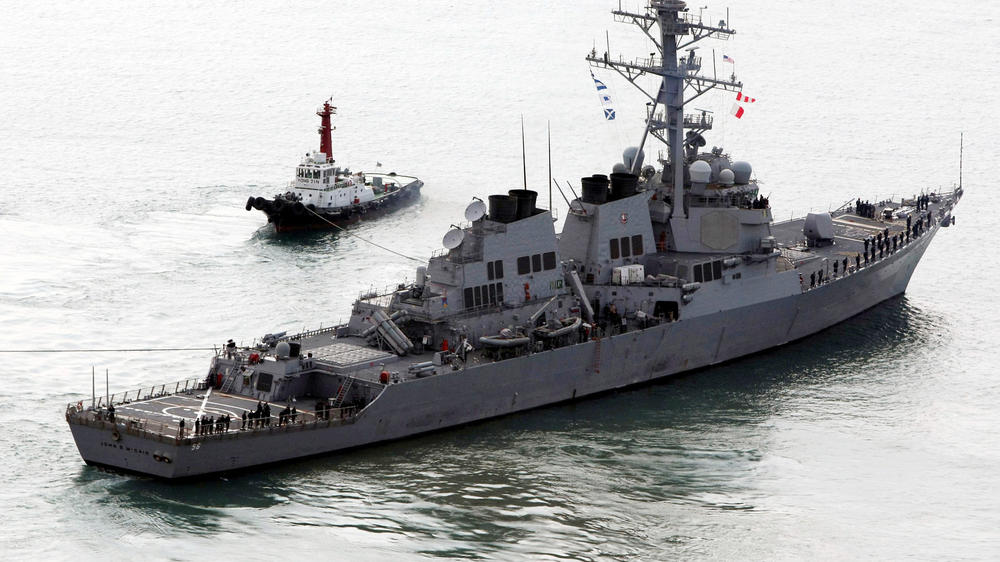 The  John S. McCain (DDG-56) leaves a naval port in Busan, South Korea, in 2009.