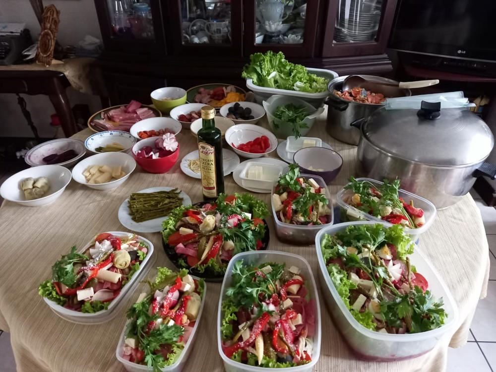 This year, fiambre was made in the garage. Family members came to pick up their share instead of coming together for a festive meal.