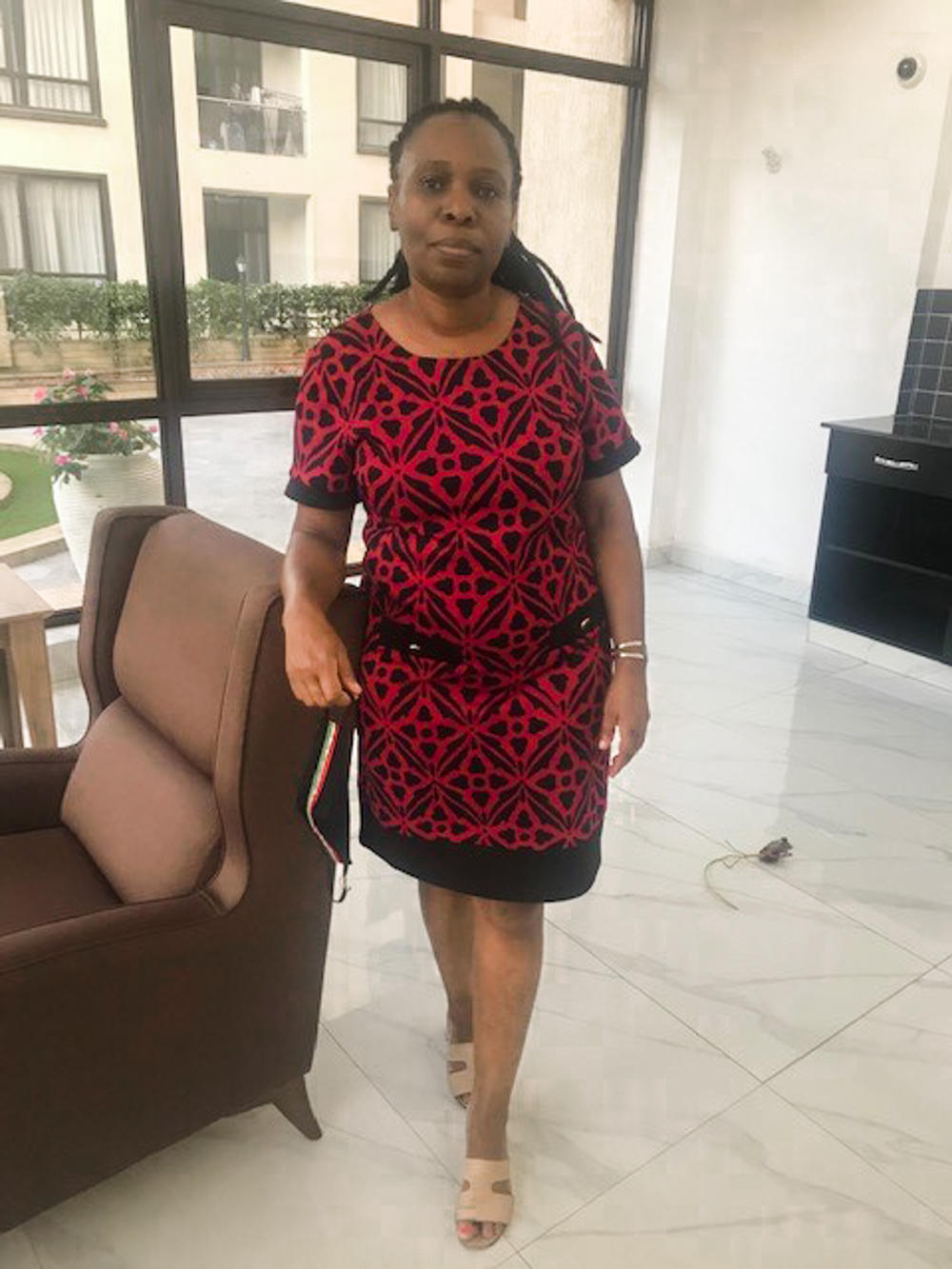 Jane Otai dressed up for her small Mashujaa celebration at home in Nairobi, Kenya. In a way she didn't miss all the typical hoopla. And in a way, she did.