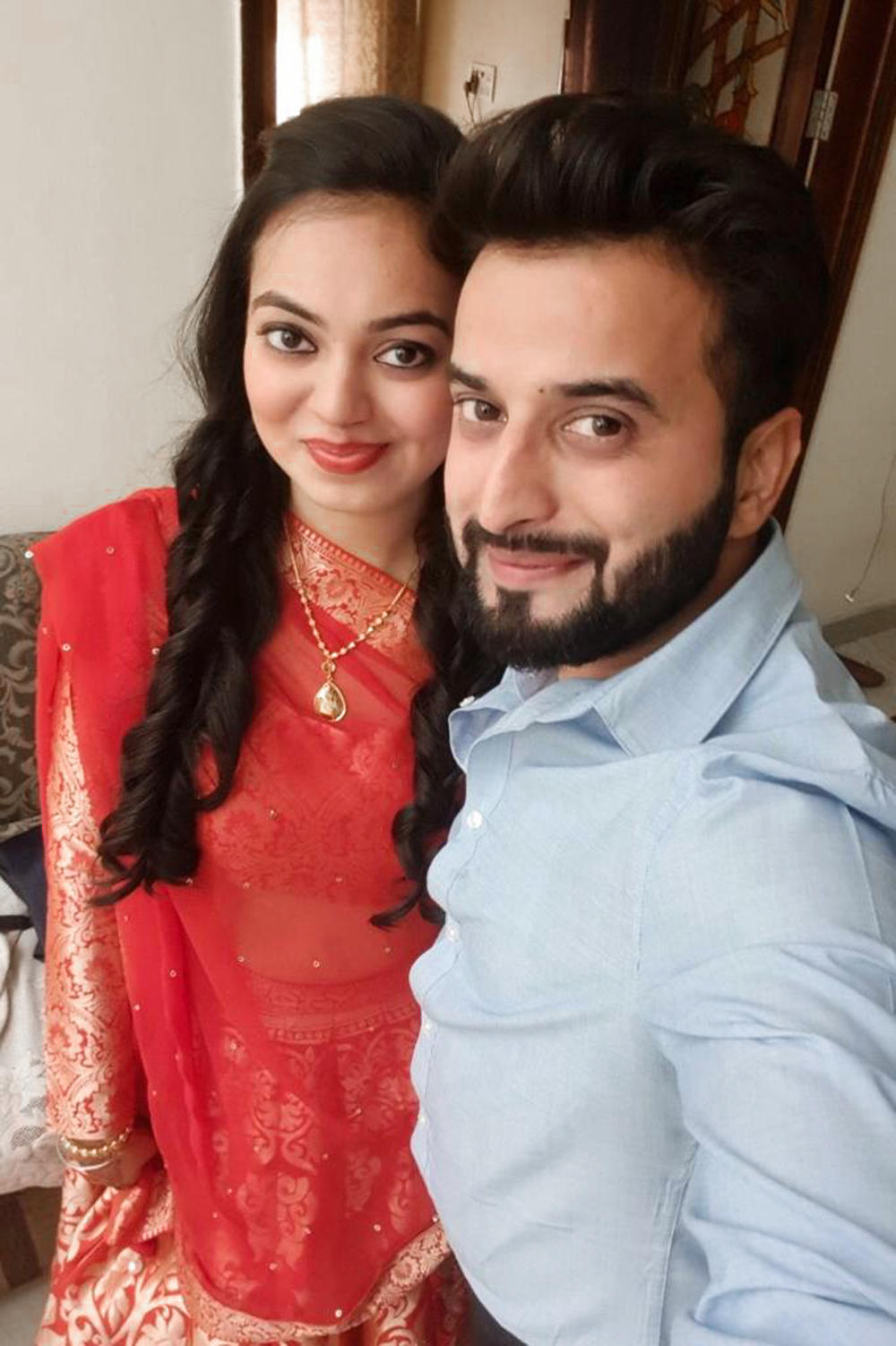 Tushar Mehta and his wife, Riddhi, on Diwali. The couple joined friends for their traditional holiday card games but used a digital version.