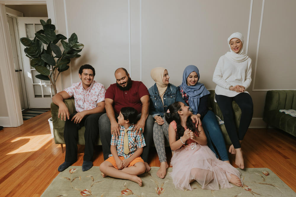 Left to right: Naji, Ibrahim, Ahmed, Adeebah, Rahaf, Ammal and Hala Aldabaan in their Connecticut home.