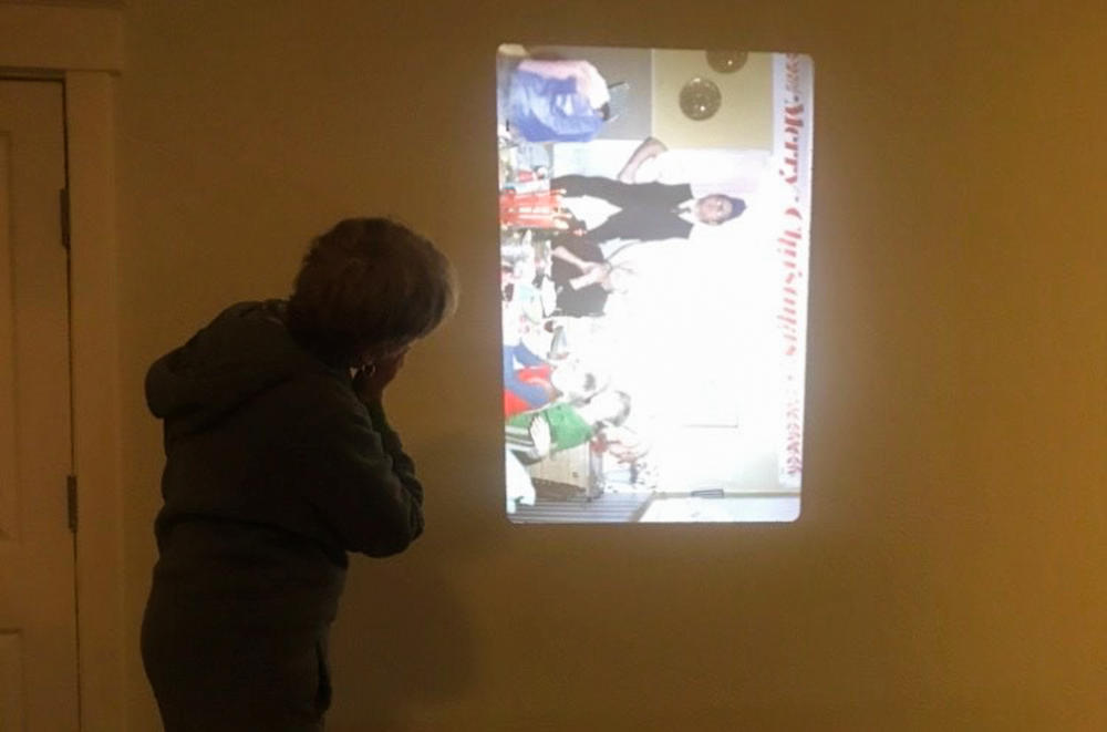 On Canada's Thanksgiving holiday, Emma Park's grandmother reminisced about family photos on the slide projector (which seems to have a sideways point of view).