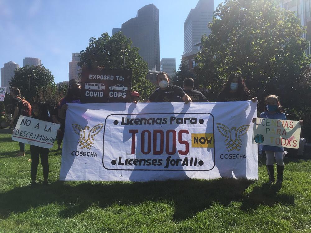 Immigrant rights activists rally for drivers licenses in Boston.