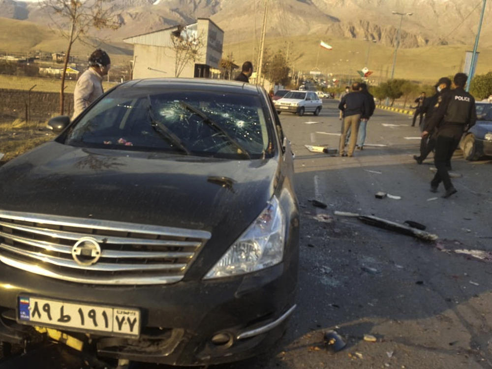 This photo released by the semiofficial Fars News Agency shows the scene where Mohsen Fakhrizadeh was reportedly killed in Absard, a small city just east of Tehran, Iran, on Friday. Fakhrizadeh, an Iranian scientist that Israel alleged led the Islamic Republic's military nuclear program until its disbanding in the early 2000s, was 