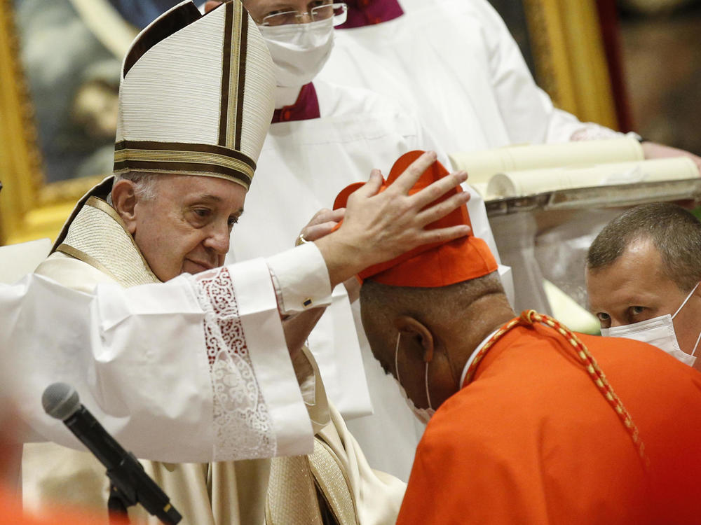 Archbishop Wilton Gregory of Washington, D.C., becomes a cardinal during a ceremony Saturday known as a consistory in St. Peter's Basilica at the Vatican. Pope Francis cautioned new cardinals never to lose their connection to the people.