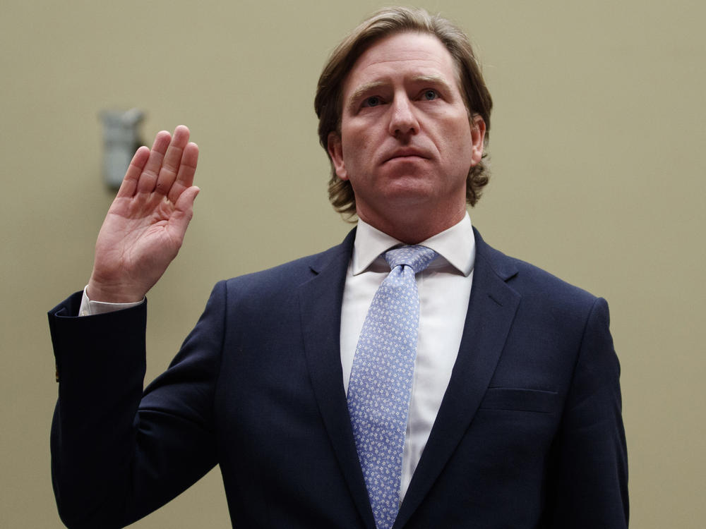 Christopher Krebs, recently ousted as director of the Department of Homeland Security's Cybersecurity and Infrastructure Security Agency, is sworn in to testify last year on Capitol Hill.
