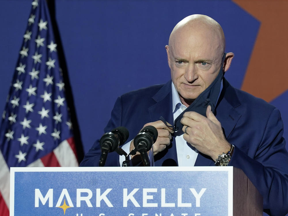 Sen.-elect Mark Kelly prepares to speak at an election night event in Tucson, Ariz. Kelly is set to be sworn in on Wednesday.