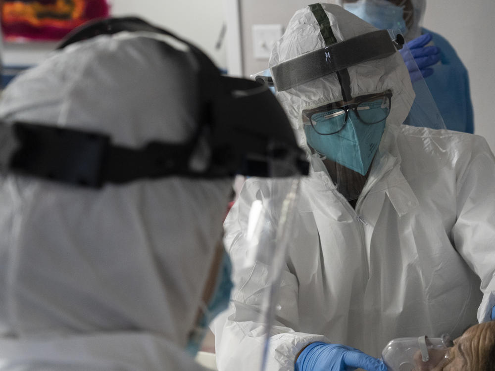 The U.S. hit a record high coronavirus hospitalization rate Wednesday, putting further strain on the nation's already stressed hospitals.