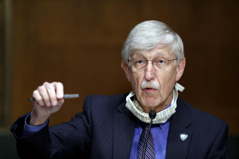 National Institutes of Health Director Dr. Francis Collins speaks during a Senate hearing earlier this year. On Thursday, Collins called on religious leaders to keep their worship spaces closed, despite rising protests from some church leaders.