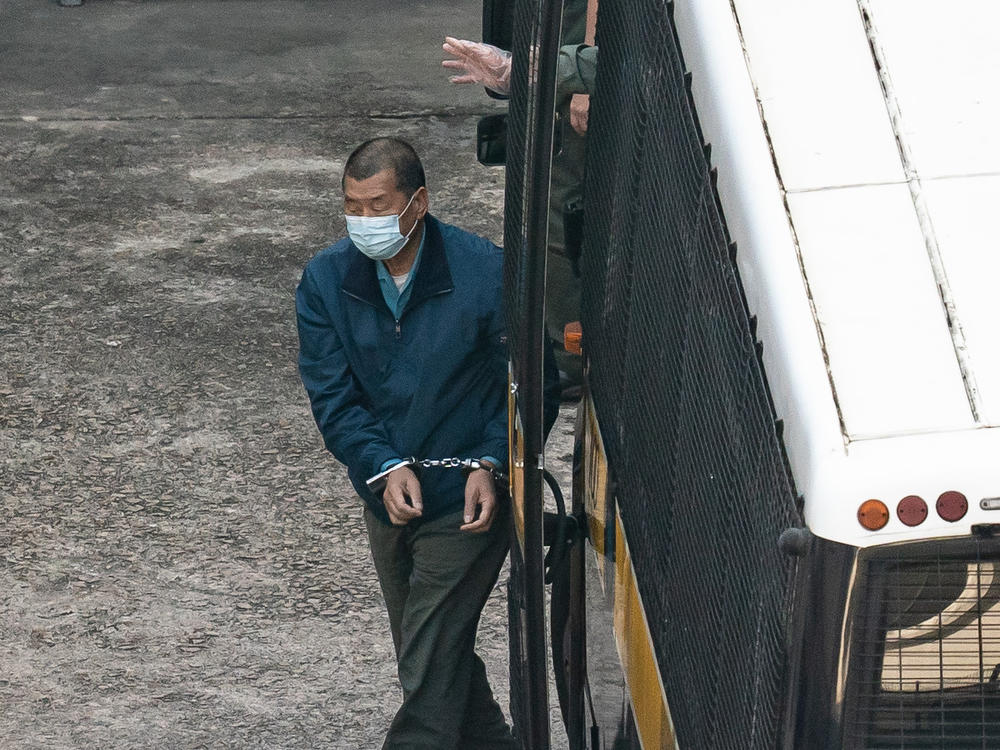 Jimmy Lai, publisher of the China-skeptic <em>Apple Daily</em> newspaper, is seen in custody in Hong Kong on Thursday. Charged with fraud, he can expect to be in custody until at least April 16, when his case will be heard next.