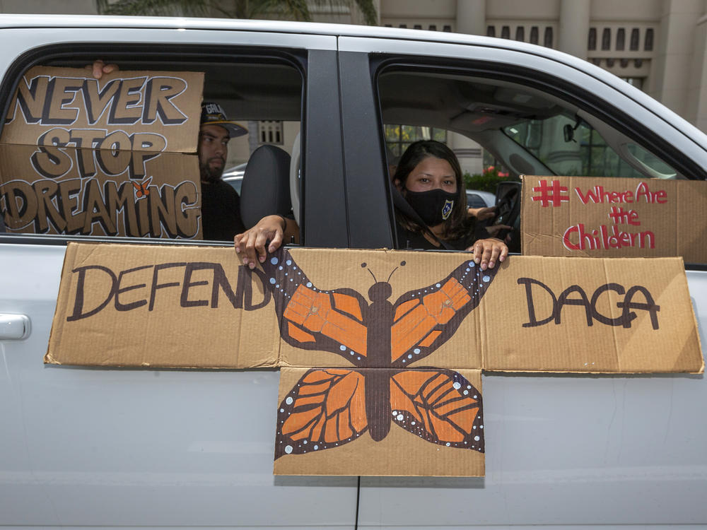 People demonstrate in June in Los Angeles in favor of the Deferred Action for Childhood Arrivals program. Immigrant rights advocates hailed a Friday court ruling allowing new applications as a 