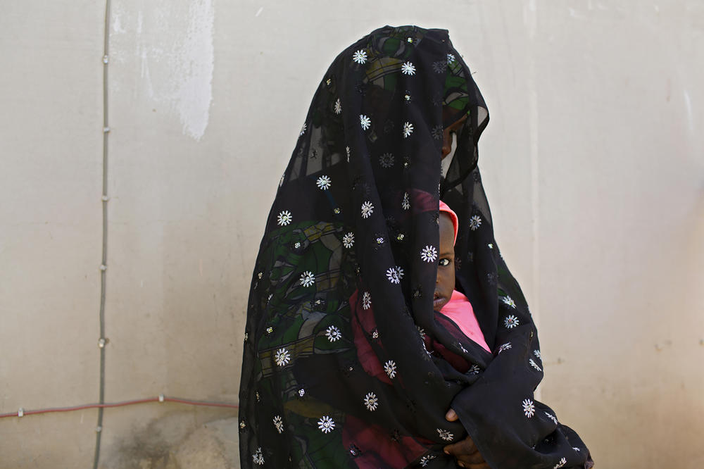 Zara, 19, was forced to live in Nigeria's Sambisa Forest, Boko Haram's headquarters, after her husband joined the insurgents when their daughter was only two months old. This portrait was taken at a safe house in Maiduguri, where women who have suffered sexual assault, forced marriage or other abuses at the hands of the insurgents are provided support.