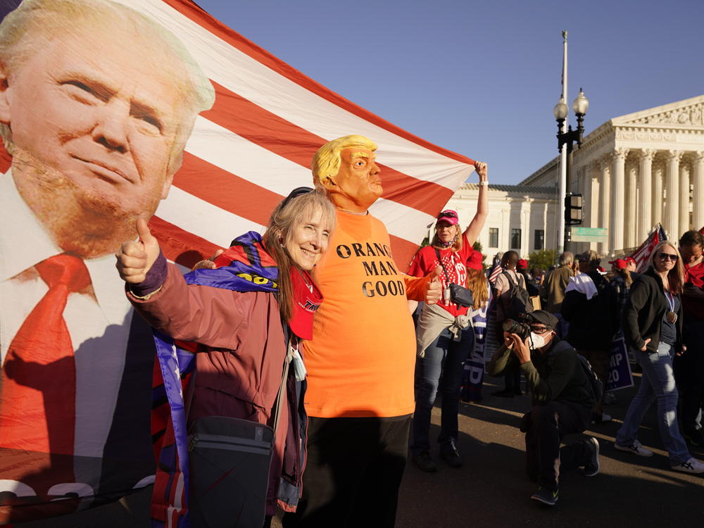 Supporters of President Trump attend pro-Trump marches outside the Supreme Court in Washington on Nov. 14. The Trump team was dealt several losses in multiple courts Friday.
