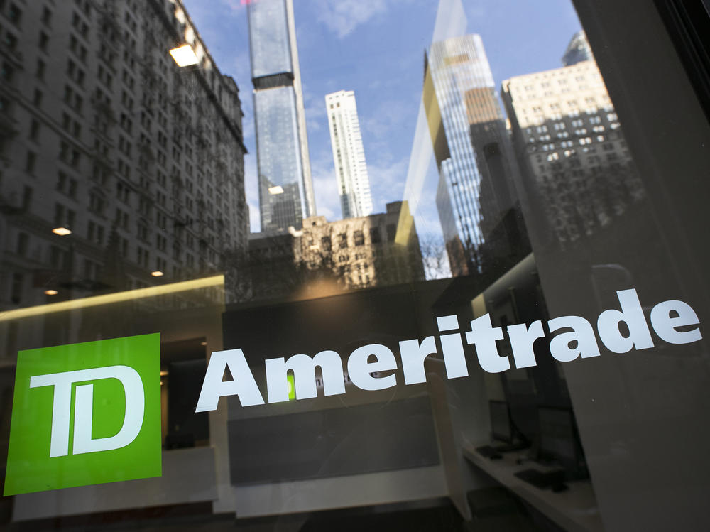 The logo for TD Ameritrade appears on an office window for the company. Trading apps are seeing a boom in customers as people flock to trading stocks during the pandemic.