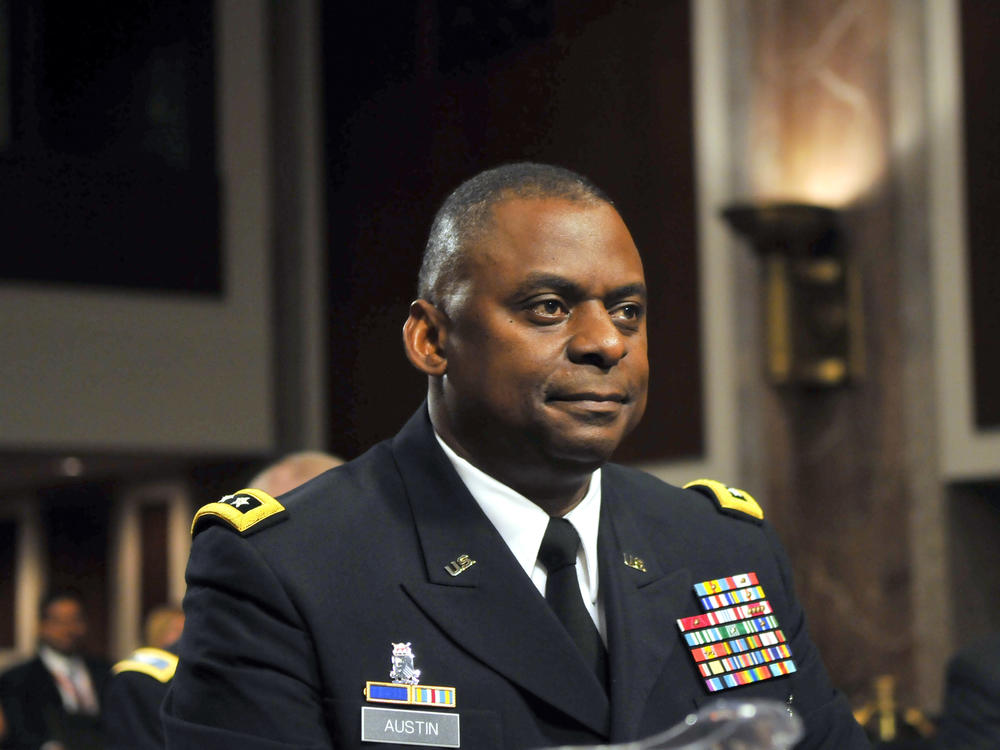 In this 2010 photo, Army Lt. Gen. Lloyd Austin appears at a Senate Armed Services Committee hearing on his  reappointment to be commander of the U.S. forces in Iraq. President-elect Joe Biden plans to nominate Austin as the first African-American to be defense secretary.