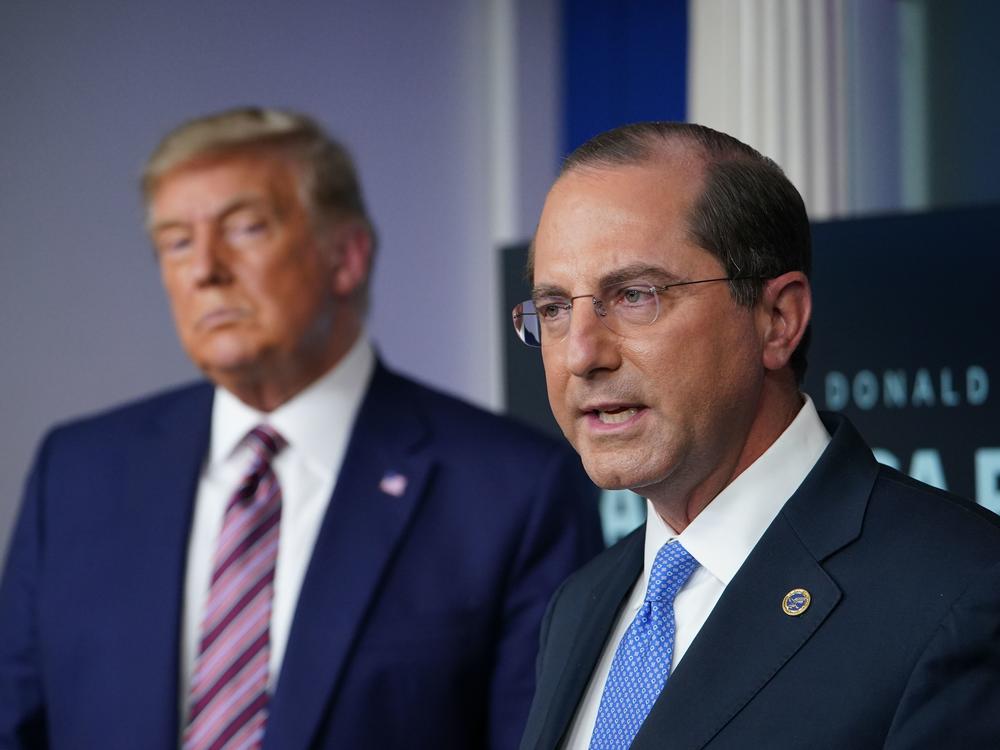 A proposed rule could cause headaches and extra work for the successor of Health and Human Services Secretary Alex Azar, seen with President Trump in November.