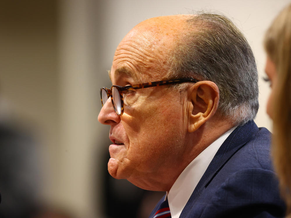 President Trump's personal attorney Rudy Giuliani speaks during an appearance last week before the Michigan House Oversight Committee in Lansing. Days later, it was revealed he had tested positive for the coronavirus.