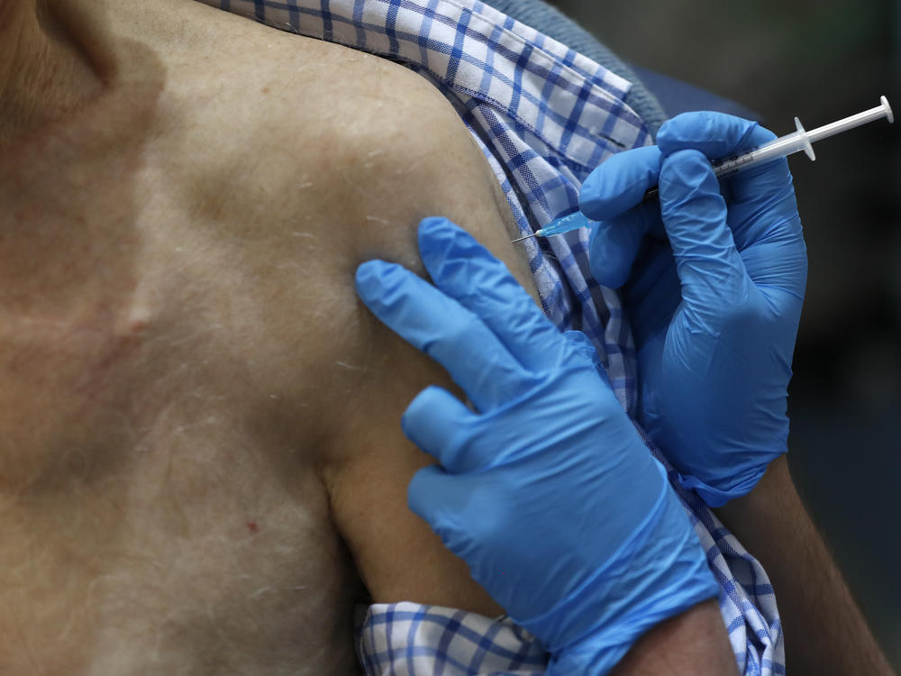 The U.K. launched its largest-ever immunization program Tuesday. Health officials began dispensing doses of the Pfizer and BioNTech coronavirus vaccine, first vaccinating health care workers and residents over the age of 80.