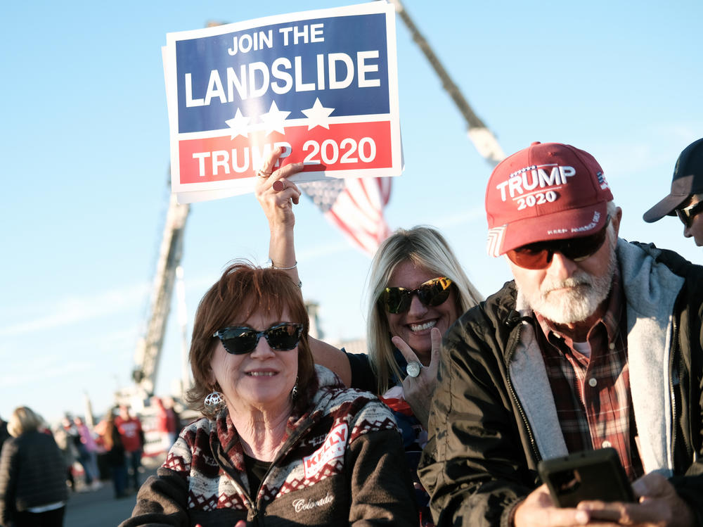 Supporters arrive for a President Trump rally in Valdosta, Ga., last weekend. Fewer than half of Trump backers said they would get the COVID-19 vaccine in a new poll.