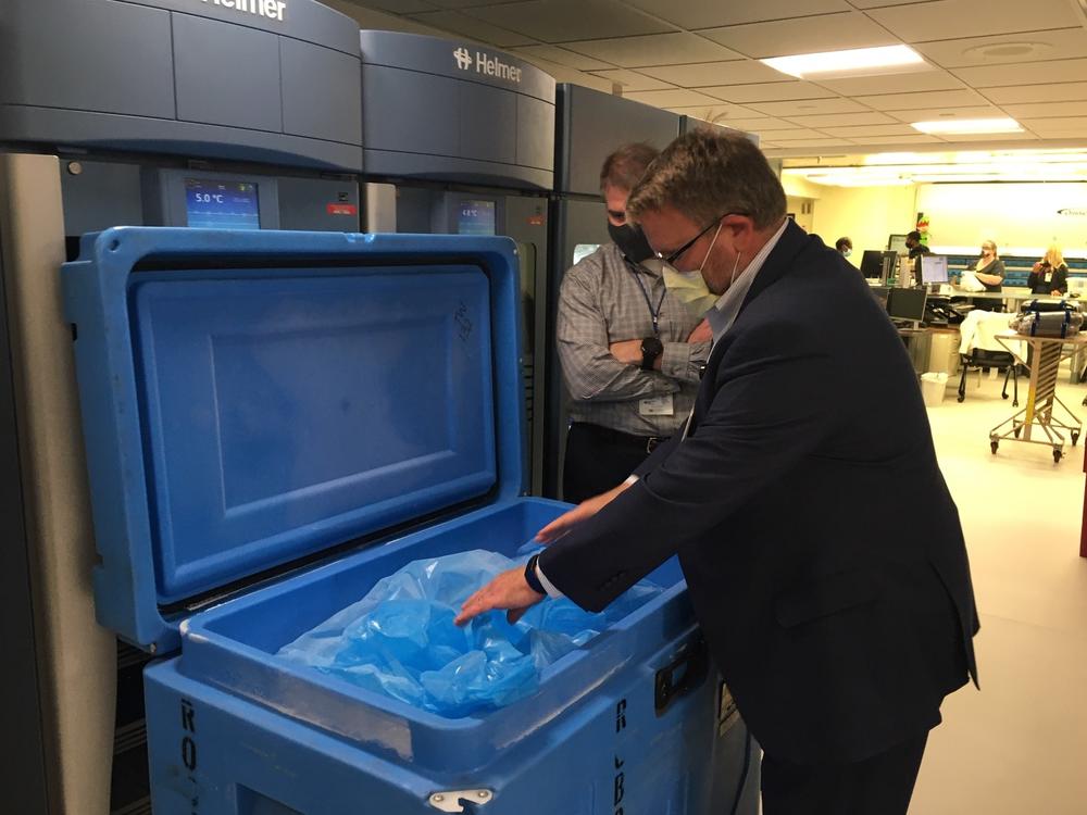 Tim Jennings (foreground) and Jon Horton, officials at Sentara Norfolk General Hospital in Norfolk, Va., have been lining up supplies, including dry ice, in preparation for the coronavirus vaccine.