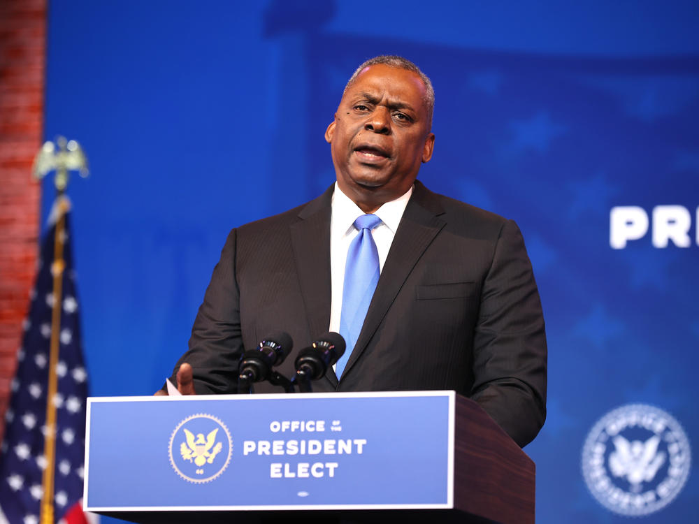 Retired Army Gen. Lloyd Austin speaks Wednesday in Wilmington, Del., after being formally introduced as President-elect Joe Biden's choice for secretary of the Department of Defense.