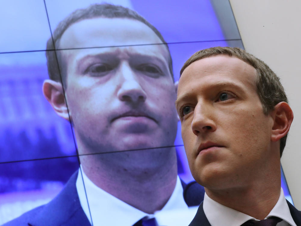 Facebook CEO Mark Zuckerberg testifies before the House Financial Services Committee in 2019. His company has been hit with twin lawsuits alleging it abused its power in order to crush rivals.