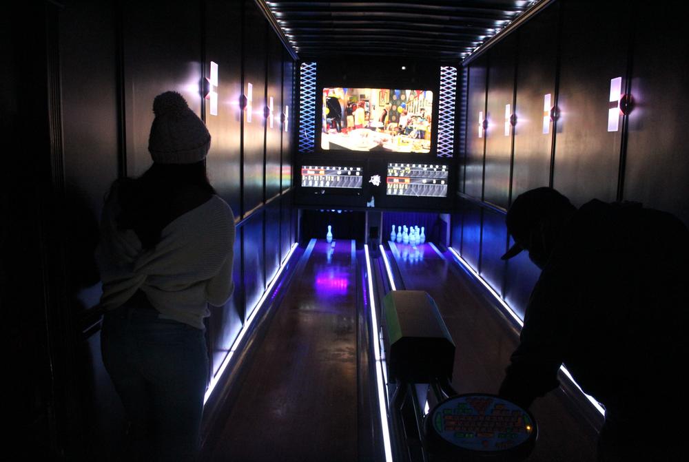 The neon-lit Luxury Strike mobile bowling alley includes two 25-foot lanes, an automatic ball return, automatic pin-resetters and even digital scorekeepers.