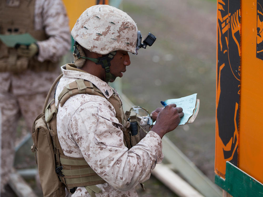 Jacques Yves Duroseau, shown here in 2016 when he was an active duty Marine, was found guilty by a federal jury over a weapons smuggling scheme.