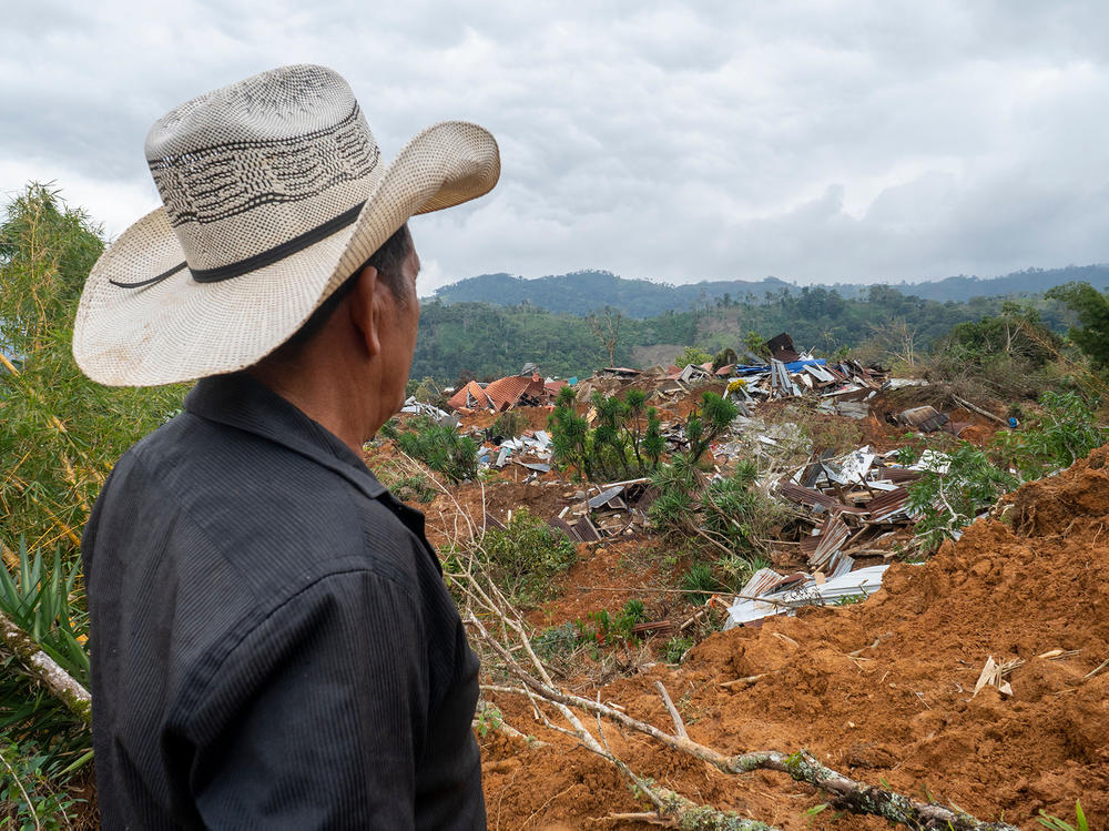 Two hurricanes destroyed bridges, roads, schools, health clinics and homes. Here is the aftermath in Protección in Honduras' Santa Barbara department on Dec. 11.