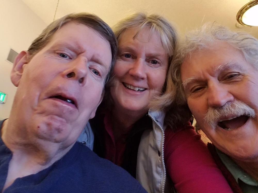 Ken Roberts (left), his stepsister, Debbie Roberts, and her husband, Steve Kinzie, at a Christmas gathering at North Valley Extended Care in Tonasket in 2018. Ken died of COVID-19 on Nov. 29 at age 66.