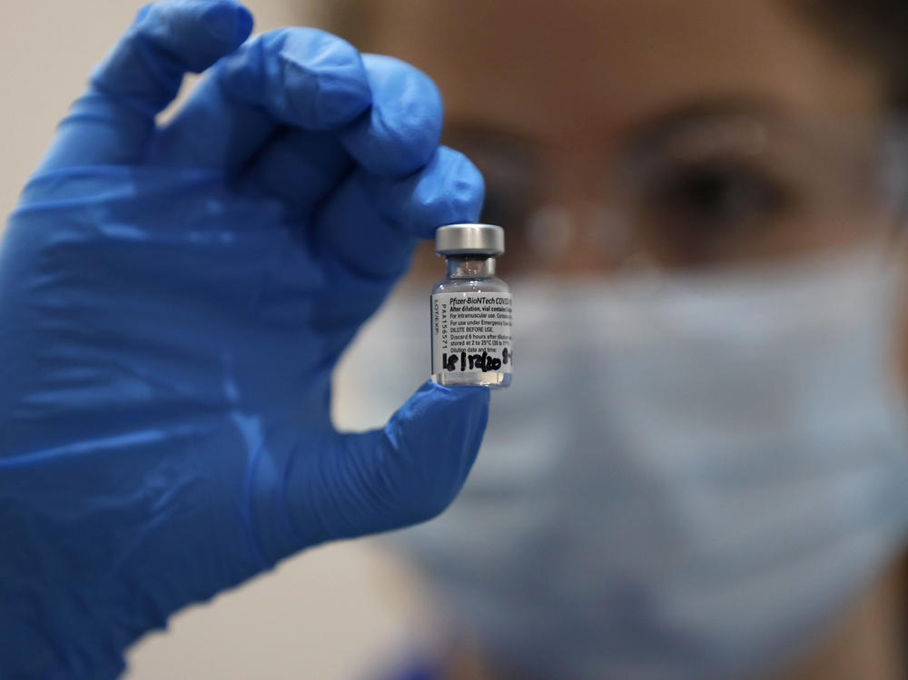 Pfizer-BioNTech's COVID-19 vaccine has been tested for safety and efficacy in more than 44,000 people. Still, stopping viral spread will take more than immunizations, says the CDC. The agency is calling for those who are vaccinated to continue wearing masks and practicing safe physical distancing.