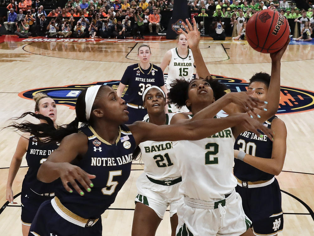 NCAA announced plans are underway to play the entire women's Division I basketball tournament in one location, San Antonio. The Baylor-Notre Dame title game in Tampa, Fla., last year is pictured.