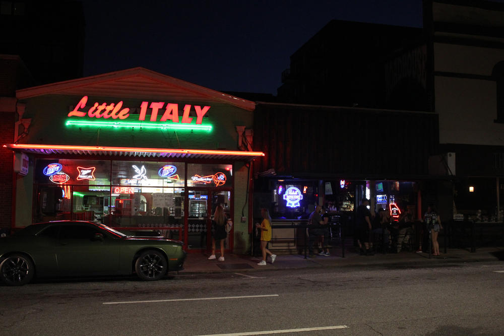 Patrons file into Little Italy's as others spend time on the patio of The Roadhouse on June 1, 2020 on North Lumpkin Street in Athens, Georgia. Bars and nightclubs were allowed to reopen for the first time since March 24 following Gov. Brian Kemp's ordinance released on May 28 that outlines 39 different safety protocols for reopening. 
