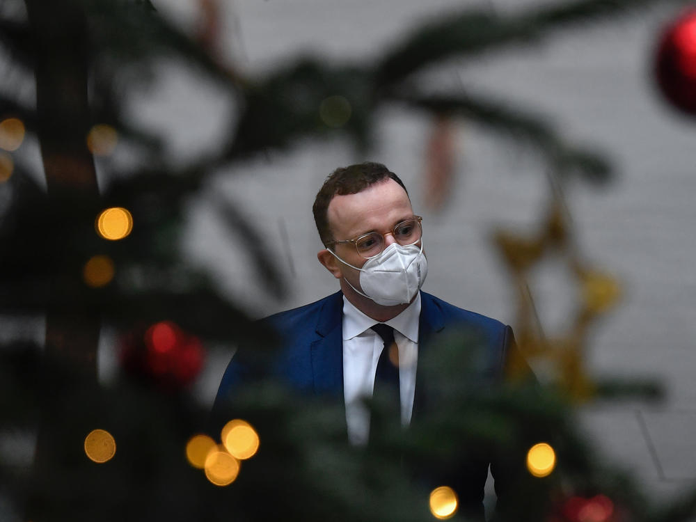 German Health Minister Jens Spahn arrives for a news conference Tuesday in Berlin. Germany is one of a handful of European countries to implement strict new coronavirus measures in anticipation of the holidays.