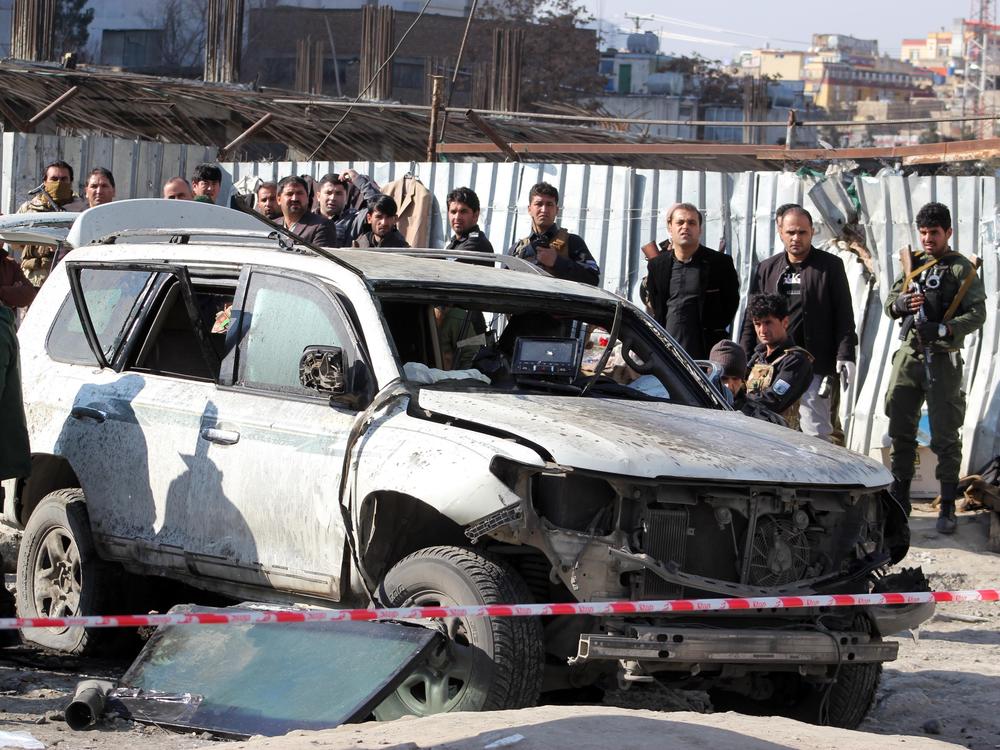 A view at the scene where Deputy Governor of Kabul Mahbubullah Muhibbi was killed in a bomb blast, in Kabul, Afghanistan, on Tuesday.