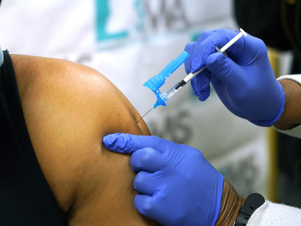 Health care workers have been throwing out the excess vaccine, fearing it would be against FDA rules to use it.