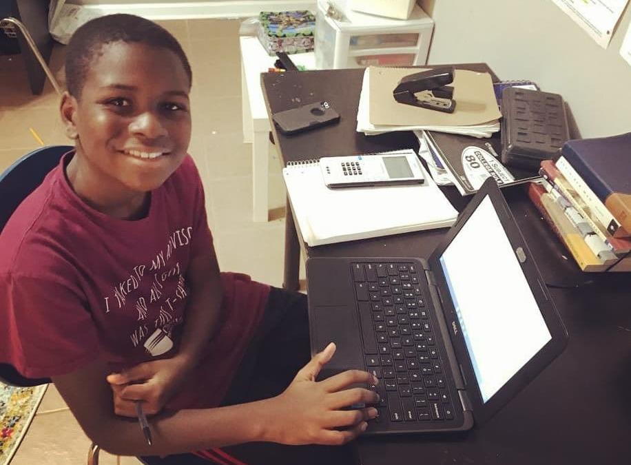 Caleb Anderson, 12, attends virtual calculus class at Chattahoochee Technical College in Marietta, Ga., where he is a sophomore.
