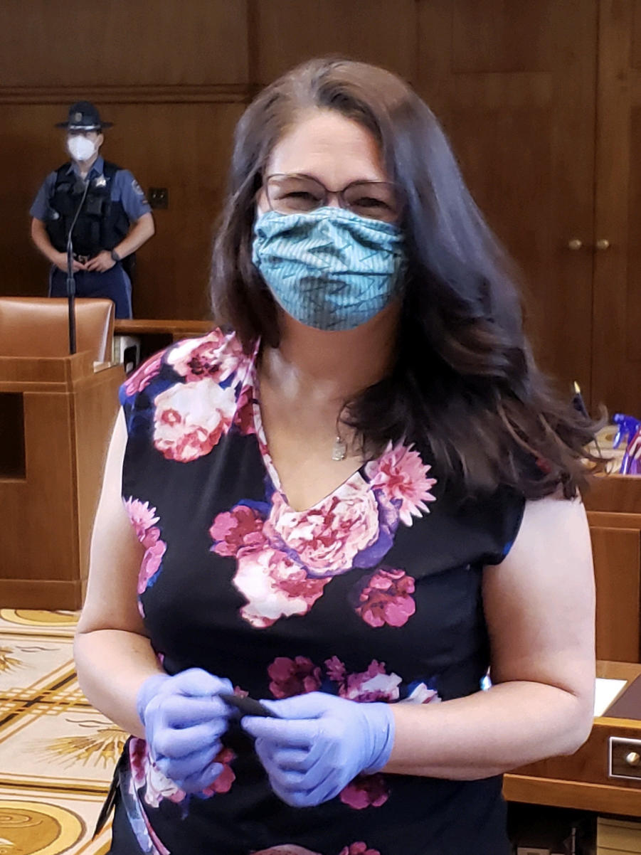 Oregon lawmaker Sara Gelser — here on the floor of the state Senate — introduced a bill to guarantee that people with disabilities get equal care in hospitals during the coronavirus pandemic.