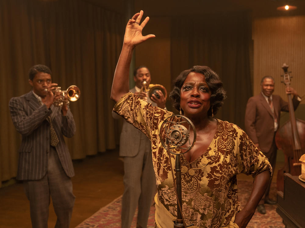 Chadwick Boseman as Levee, Colman Domingo as Cutler, Viola Davis as Ma Rainey, Michael Potts as Slow Drag, and Glynn Turman as Toledeo in <em>Ma Rainey's Black Bottom.</em>
