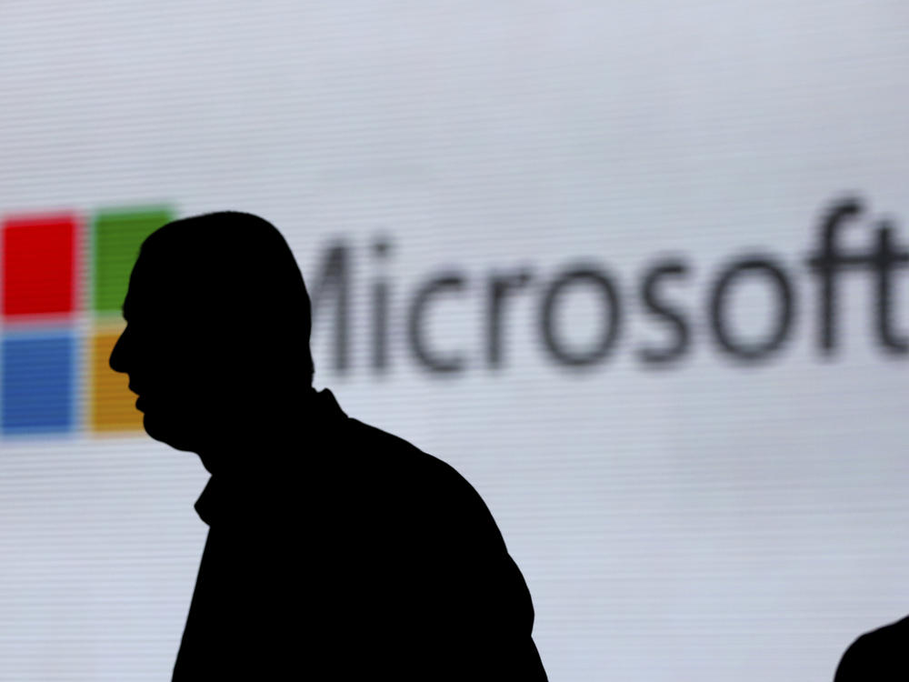 Microsoft President Brad Smith said the hack into IT management firm SolarWinds affected dozens of Microsoft's customers.