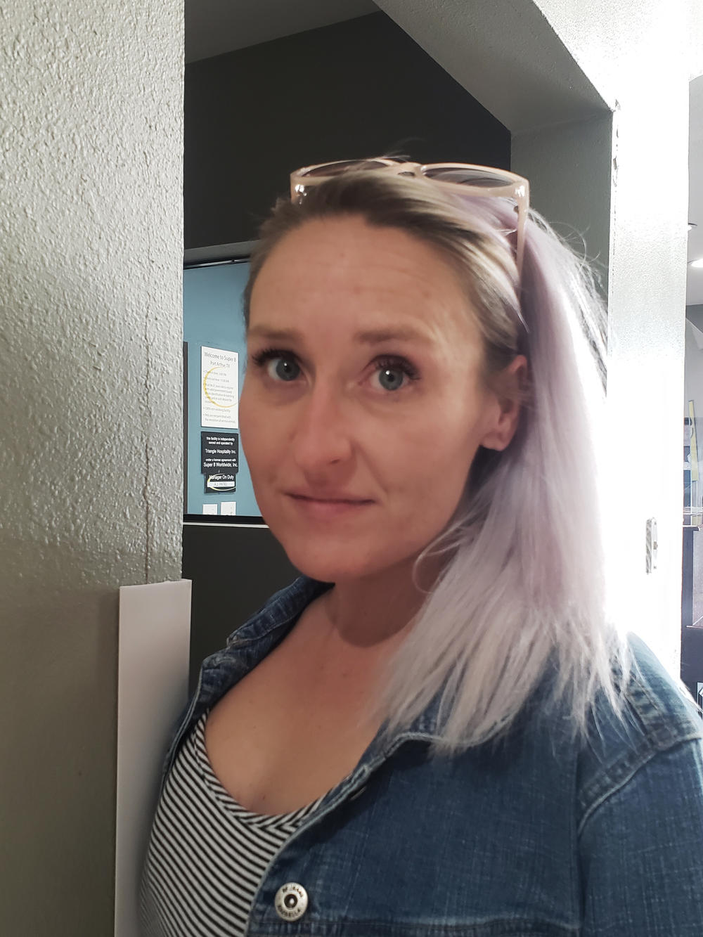 Tiffany Robinson at the hotel in Bridge City, Texas, where she and her three kids are staying as she searches for work and another place to live.