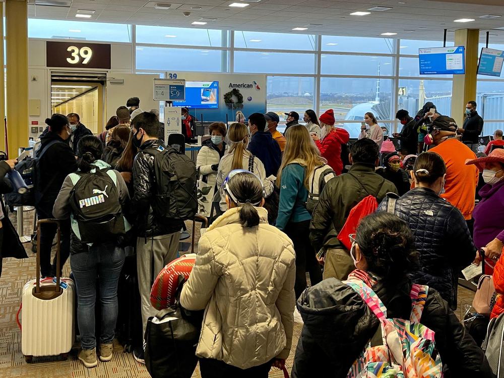 Crowds are seen at Washington's Reagan National Airport on Friday. More than a million people went through airport security each of the past two days, despite the coronavirus pandemic.