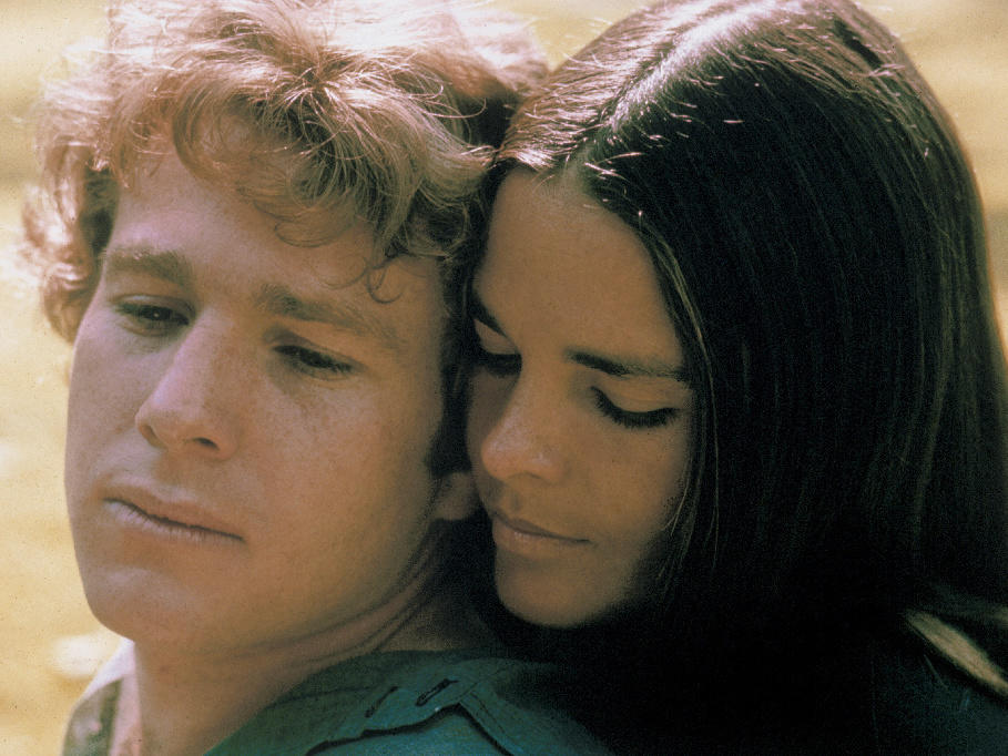 Ryan O'Neal and Ali MacGraw starred in <em>Love Story</em> — a romantic tearjerker that became the highest grossing movie of 1970. Since then, it has inspired countless ugly cries — and plenty of parodies, too.